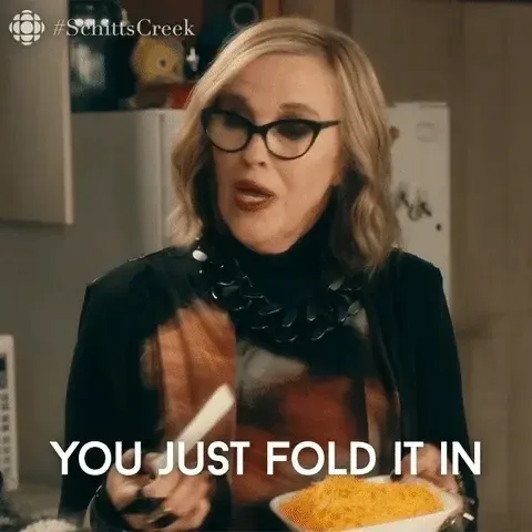 Moira Rose from the TV show Schitts Creek saying the words 'Fold it in'