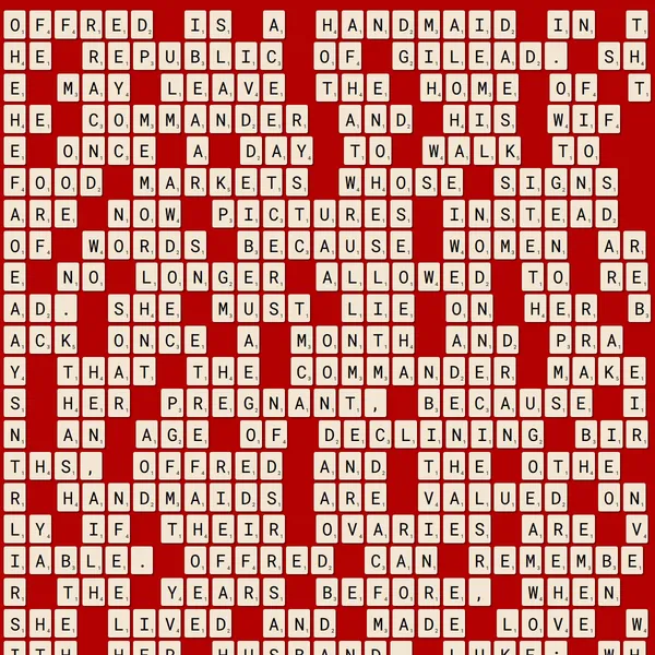 A passage from the book The Handmaid's Tale is written in scrabble tiles.