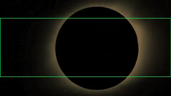 The background image is a planet in a shadown with a orangish eclipse. There is a green box around the middle section of the image highlighting the section of the image that will be used as the background