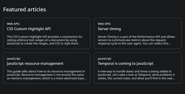 A featured articles section with 4 cards. Each has a tag, title, and a description. The description is truncated after 3 lines.